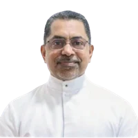 Dr. Charles Lasrado, SJ